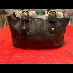 Black Leather Coach handbag. In very good condition.